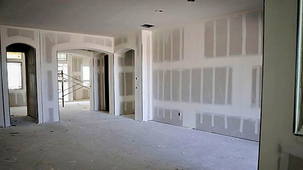 Taped and jointed plasterboard walls ready for decoration