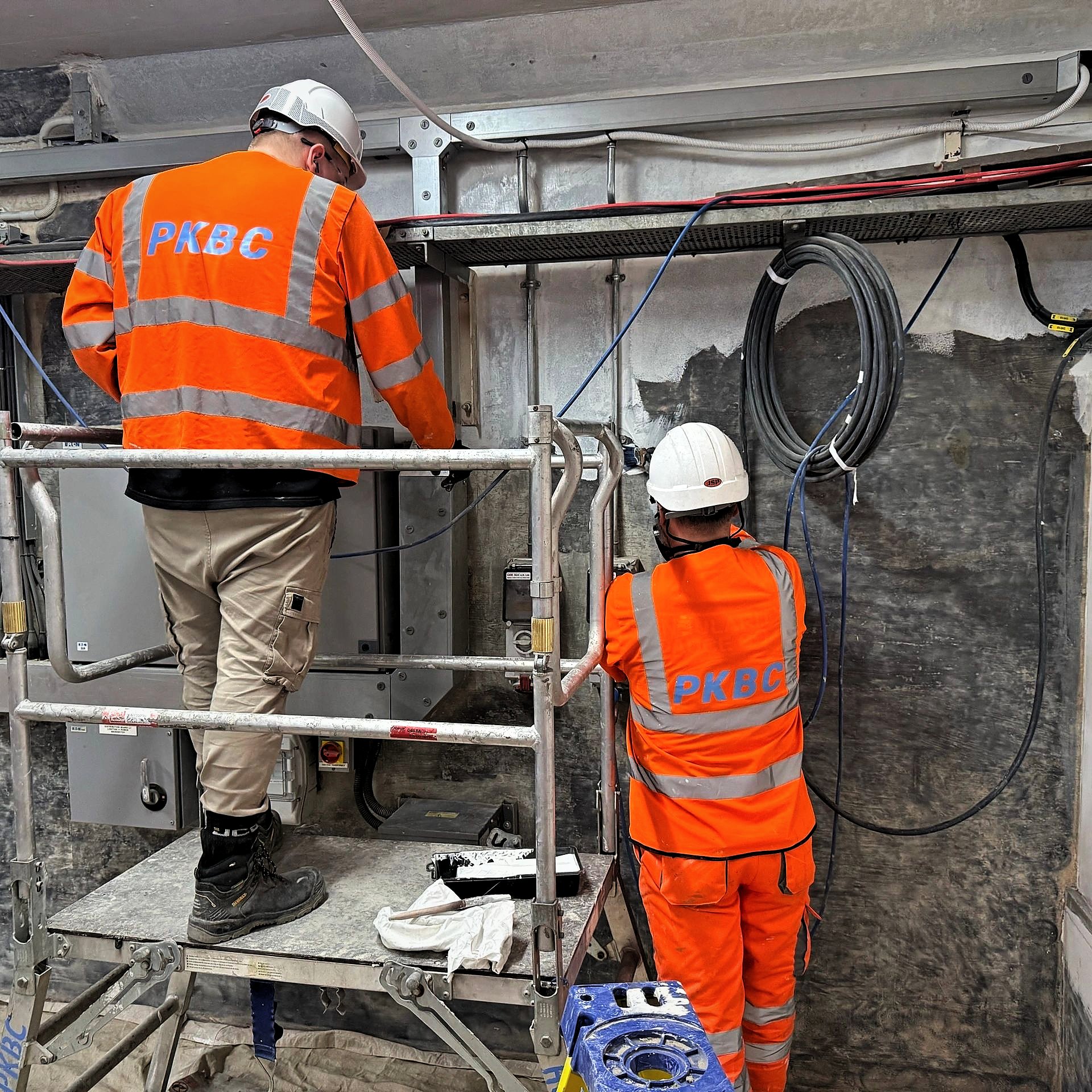 PKBC operatives working from a podium inside the existing substation building