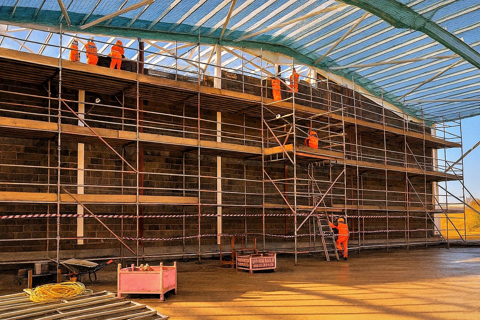 Blockwork walls and multi-lift scaffold inside the whisky warehouse