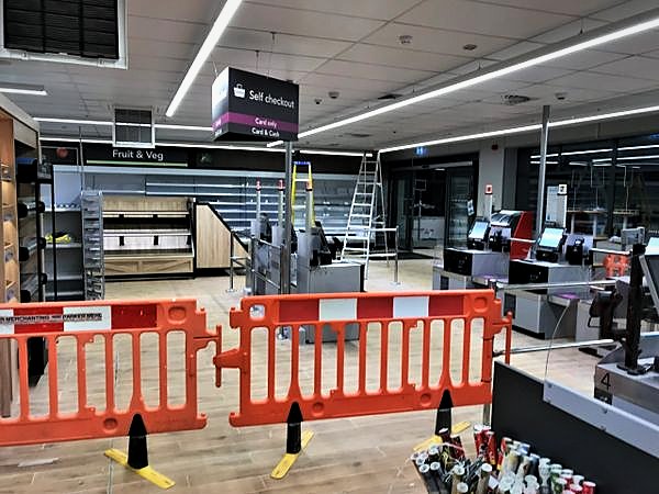New supermarket interior with self checkout area nearing completion