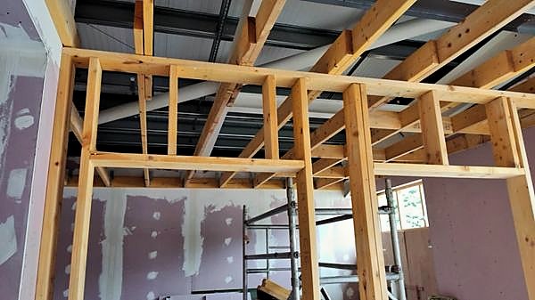 Timber framing for bulkheads above boarded walls