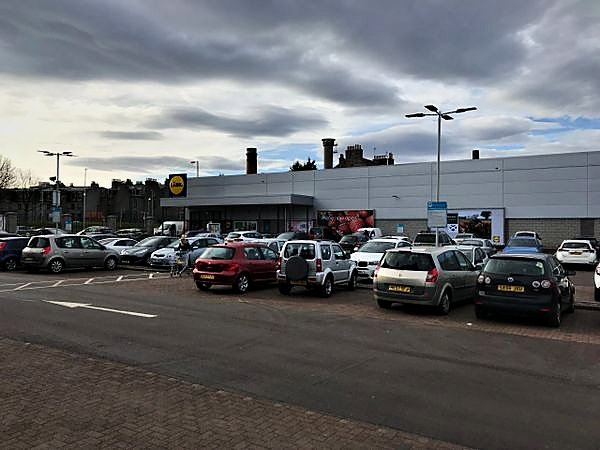 Completed supermarket store and car park
