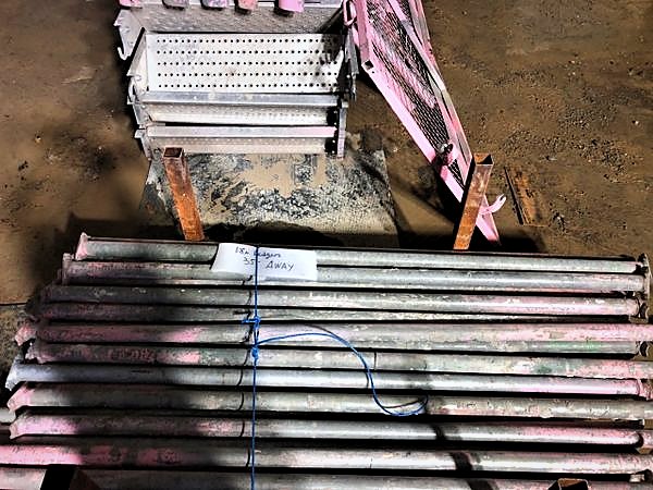Bundled scaffold ledgers counted, tagged and tied for the next lift