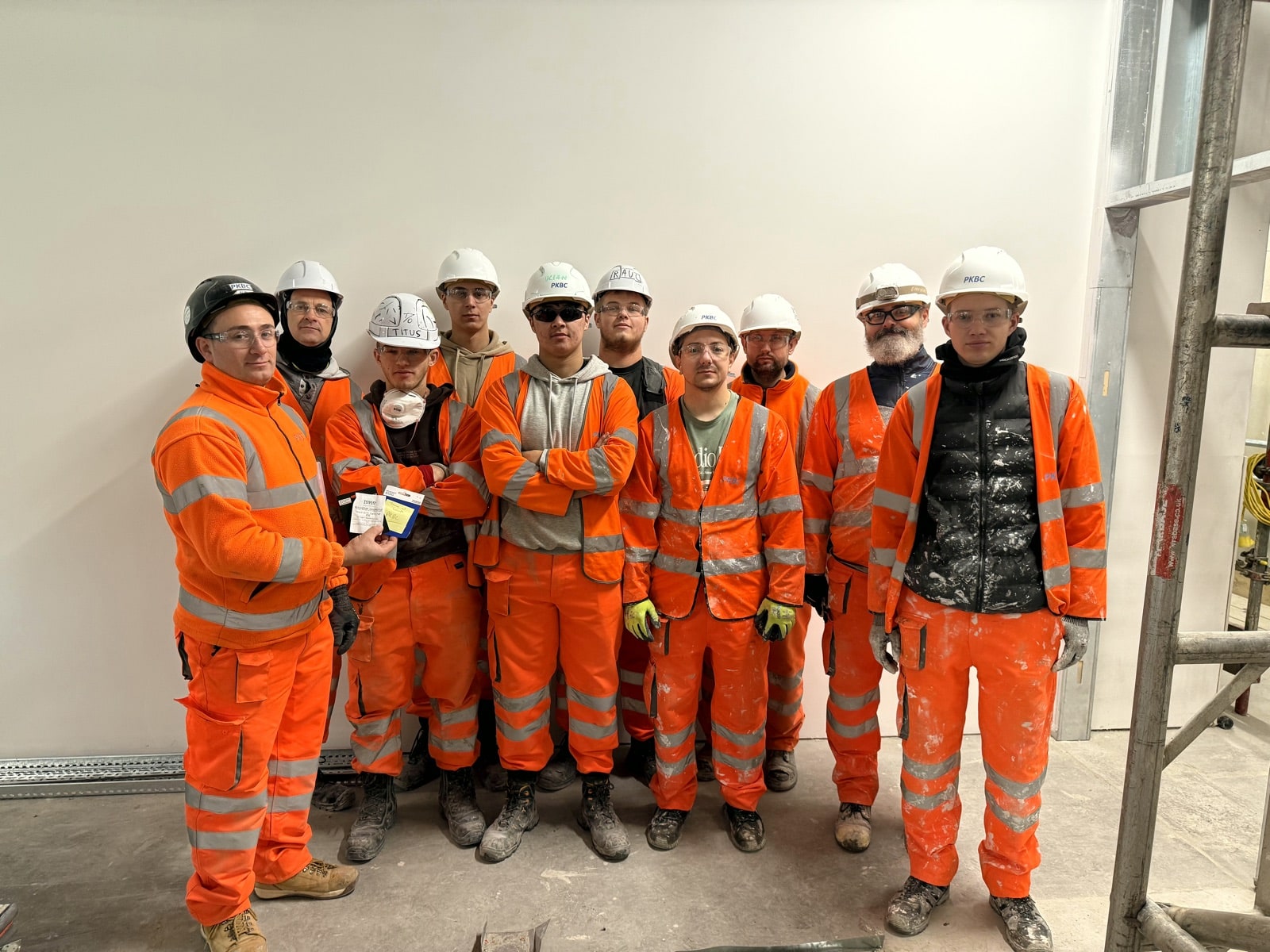 The PKBC fit-out crew on site with a Team of the Week award